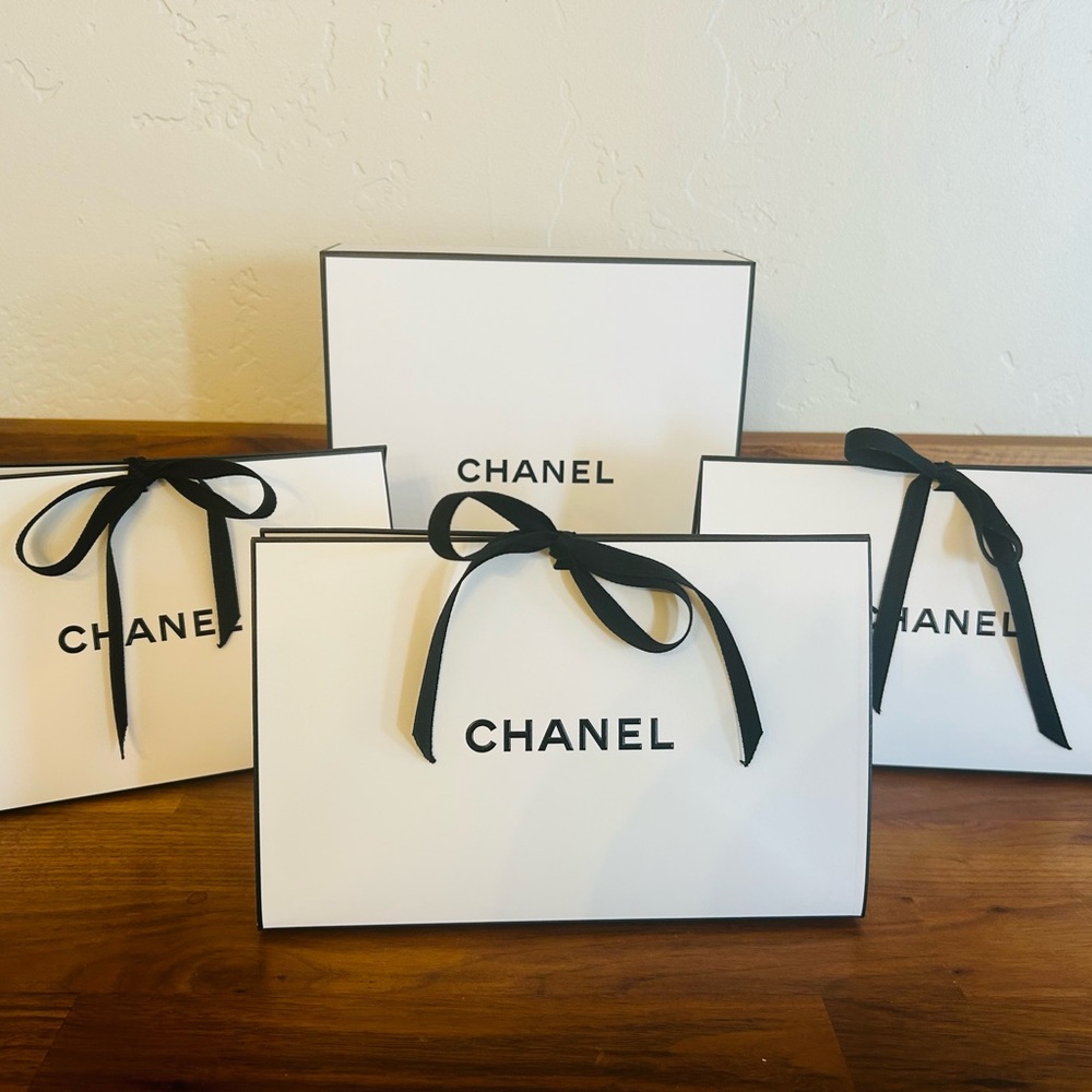 12 CHANEL Gift Bags with black ribbon